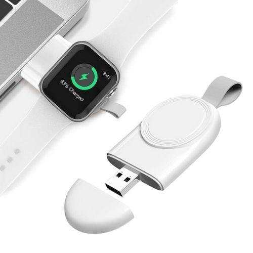 White portable wireless charging pad with a apple smartwatch and phone on a white background