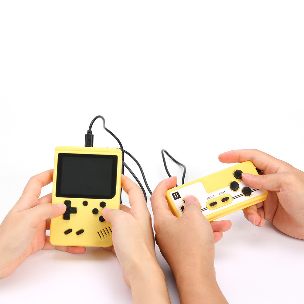 Two hands holding yellow handheld gaming devices on a white background