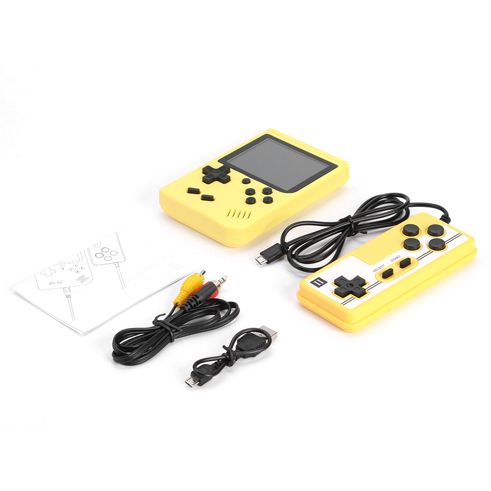 Yellow handheld gaming console with controllers and cables on a white background