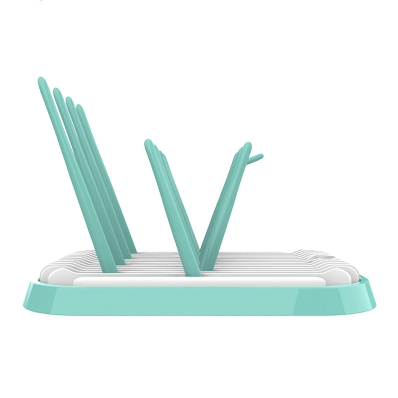 Teal and white dish rack on a white background