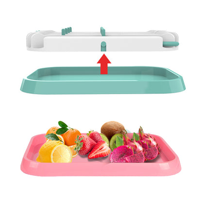 Fruit tray with compartments containing various fruits on a white background