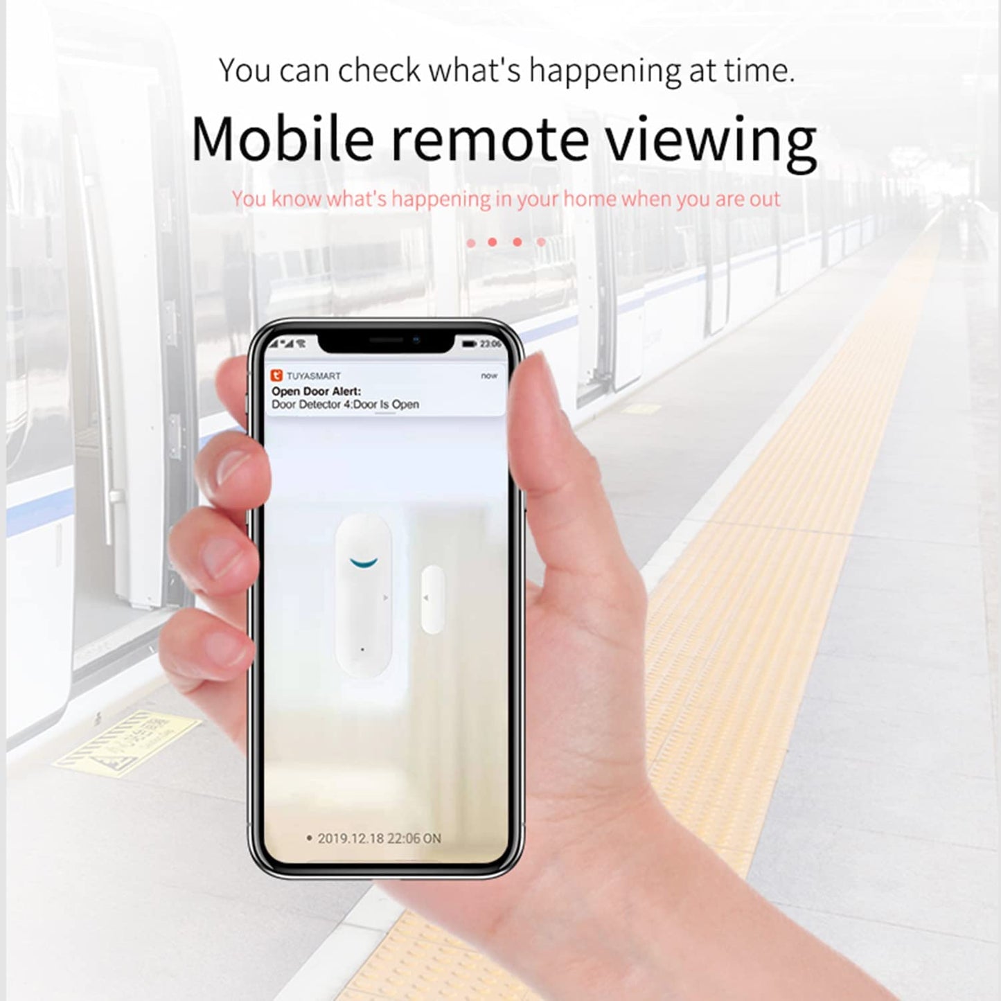Hand holding a smartphone with a home security app on a blurred indoor background
